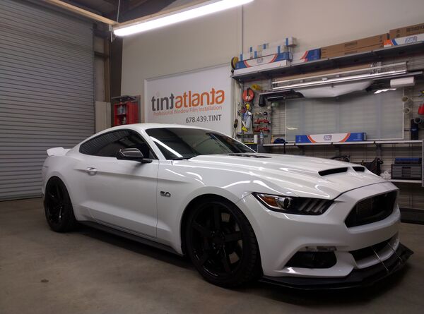 White Ford Mustang GT 5.0 with ceramic window tint installation at Tint Philadelphia Philadelphia