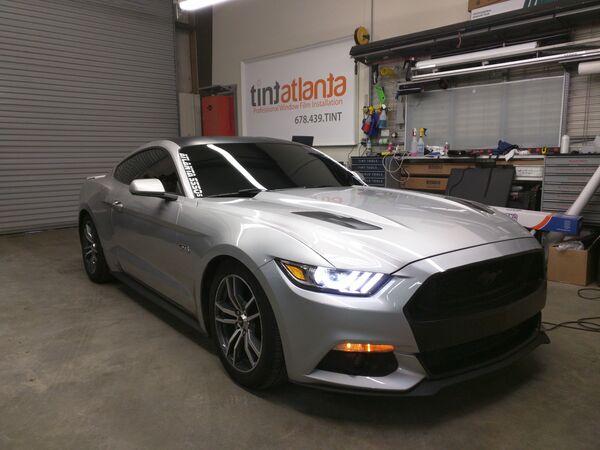 Silver Ford Mustang GT with dark ceramic window tint in Philadelphia PA